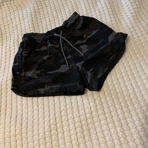 Black camouflage girls Athleta shorts